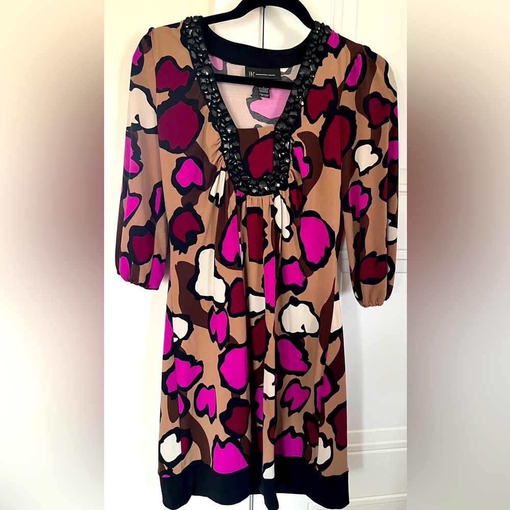INC sz small. Knee length dress with 3/4 length sleeve and jewelled neck line.